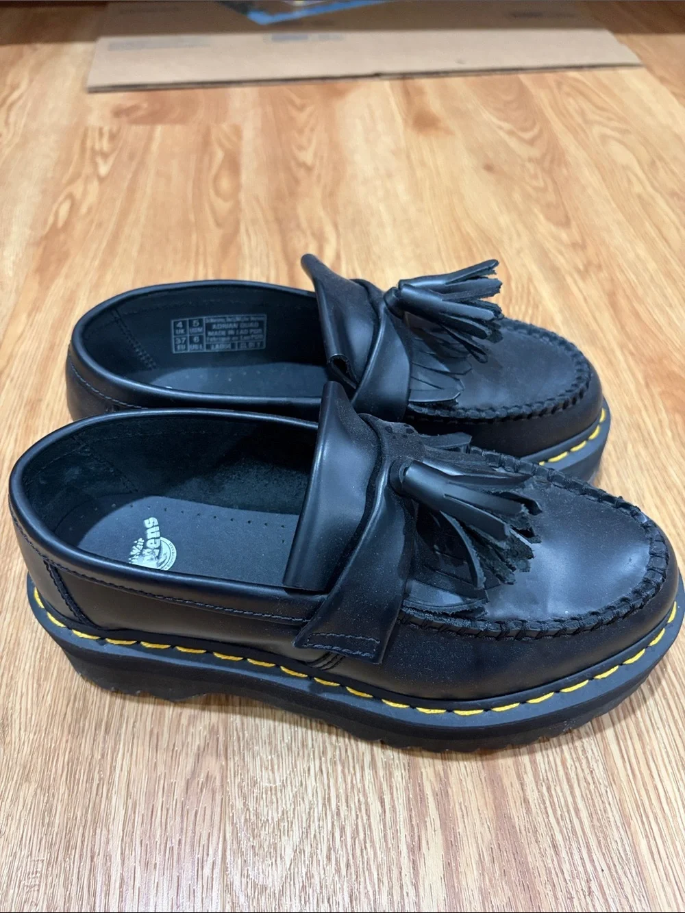 Dr. Martens Kids Black Leather Tassel Kiltie Loafers with Yellow Stitch